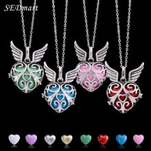 SEDmart  Angel Wings Heart Sound Bell Inside Hollow Locket Pregnant Pendant