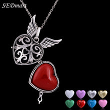 SEDmart  Angel Wings Heart Sound Bell Inside Hollow Locket Pregnant Pendant